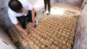 Chine : il achète sa voiture avec 17 sacs de monnaie ! Chine : il achète sa voiture avec 17 sacs de monnaie !