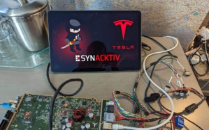 Tesla défie les Hackers : Un pirate rapporte un pactole de 450 000 $ ! Tesla défie les Hackers : Un pirate rapporte un pactole de 450 000 $ !