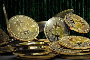 Le Bitcoin dépasse la barre mythique des 100.000 dollars Le Bitcoin dépasse la barre mythique des 100.000 dollars