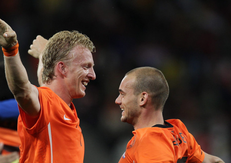 Les ex-internationaux néerlandais D. Kuyt et W. Sneijder.