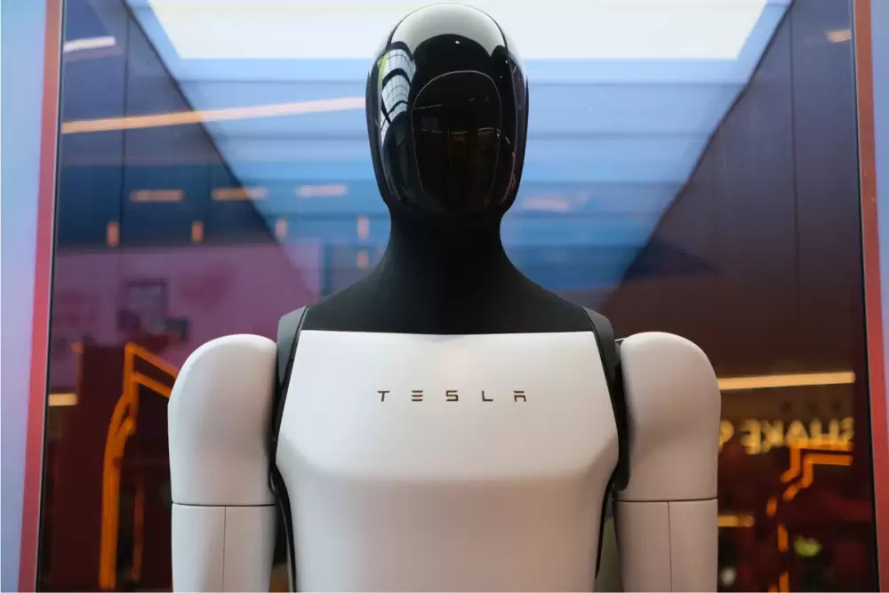 L'Humanoïde Optimus de Tesla qui danse et émerveille